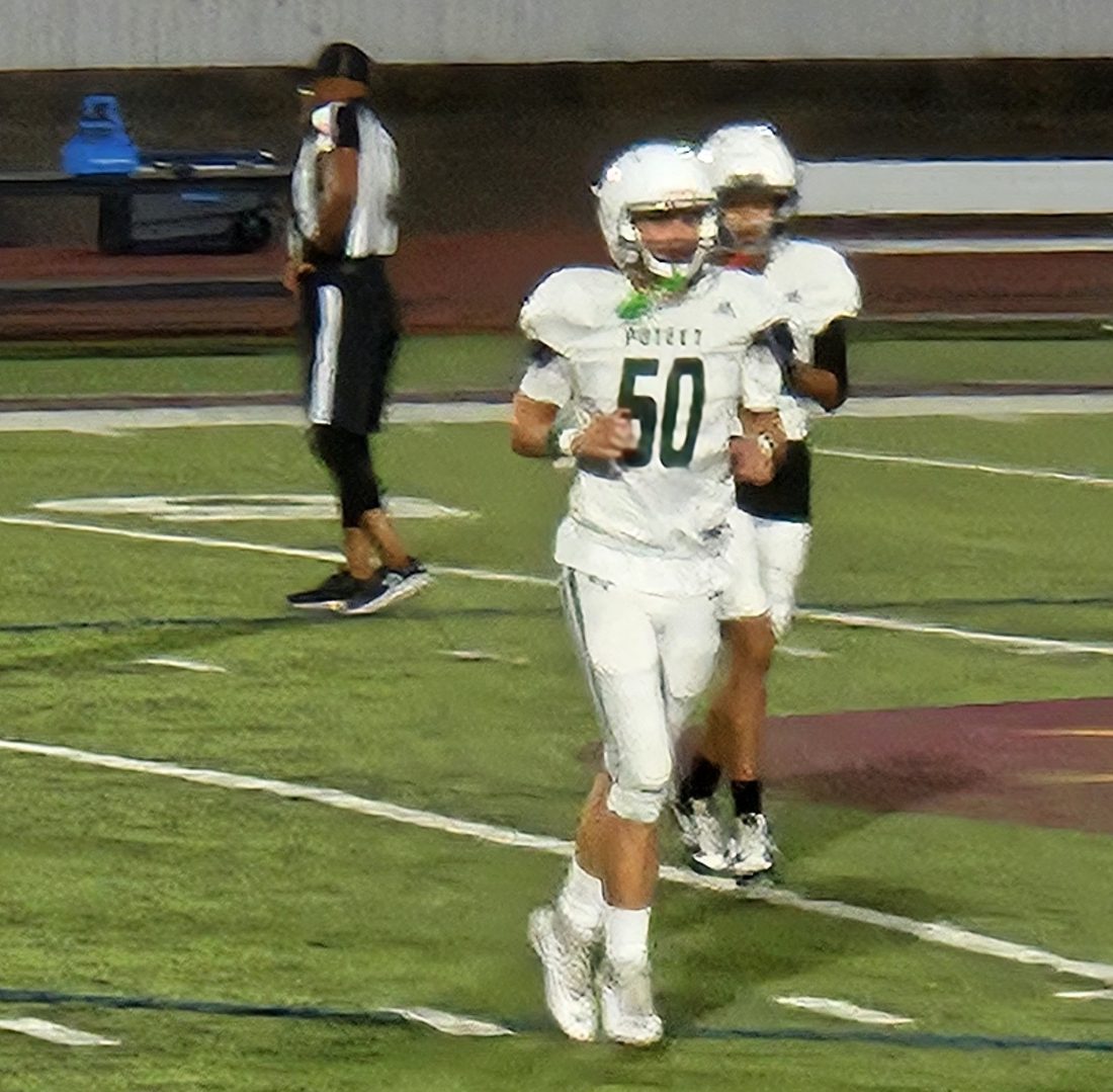 Daylen Shain in his number 50 Poteet football jersey